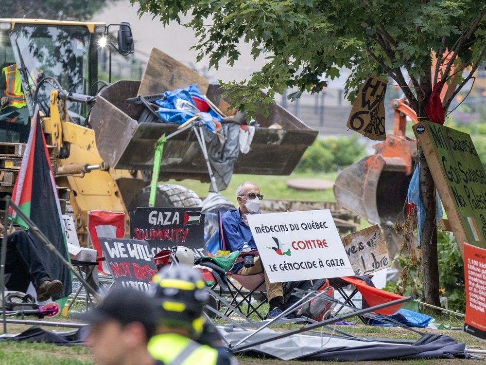 An excavator is full of debris.