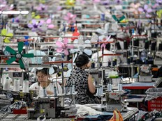 This photo taken on June 11, 2024 shows workers producing garments at a textile factory that supplies clothes to fast fashion e-commerce company Shein in Guangzhou in southern China's Guangdong province.