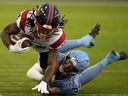 Alouettes rookie Jordan Domineck embraces golden opportunity 4 Alouettes receiver James Letcher Jr. is tackled by Argonauts linebacker Fraser Sopik during first half last week in Toronto.