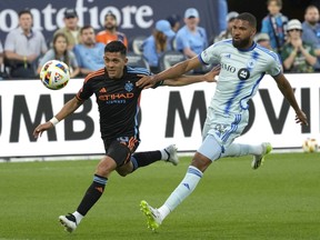 New York City FC forward Alonso Martínez, left, chases the ball with CF Montréal defender George Campbell on his heels during MLS match Wednesday in New York.
