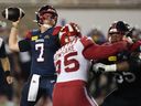Alouettes quarterback Cody Fajardo rears back to pass during game against the Stampeders at Molson Stadium last Saturday.