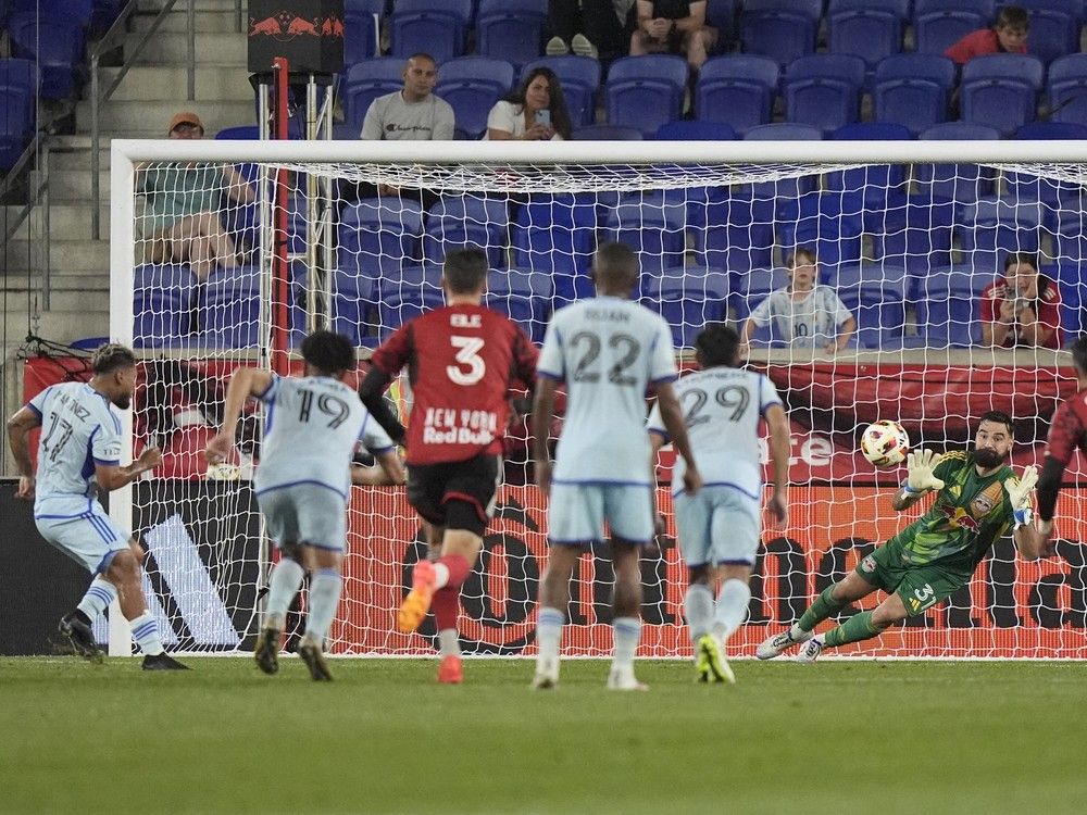 CF Montréal's Josef Martínez (17) scores on New York Red Bulls goalkeeper Carlos Miguel Coronel (31) during the second half of an MLS soccer match Wednesday, July 17, 2024, in Harrison, N.J.