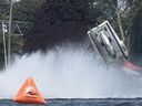 An image captured by Mario Venditti shows a boat being piloted by François Leroux flying in the air and flipping over at the Valleyfield Regattas on Sunday, July 14, 2024.