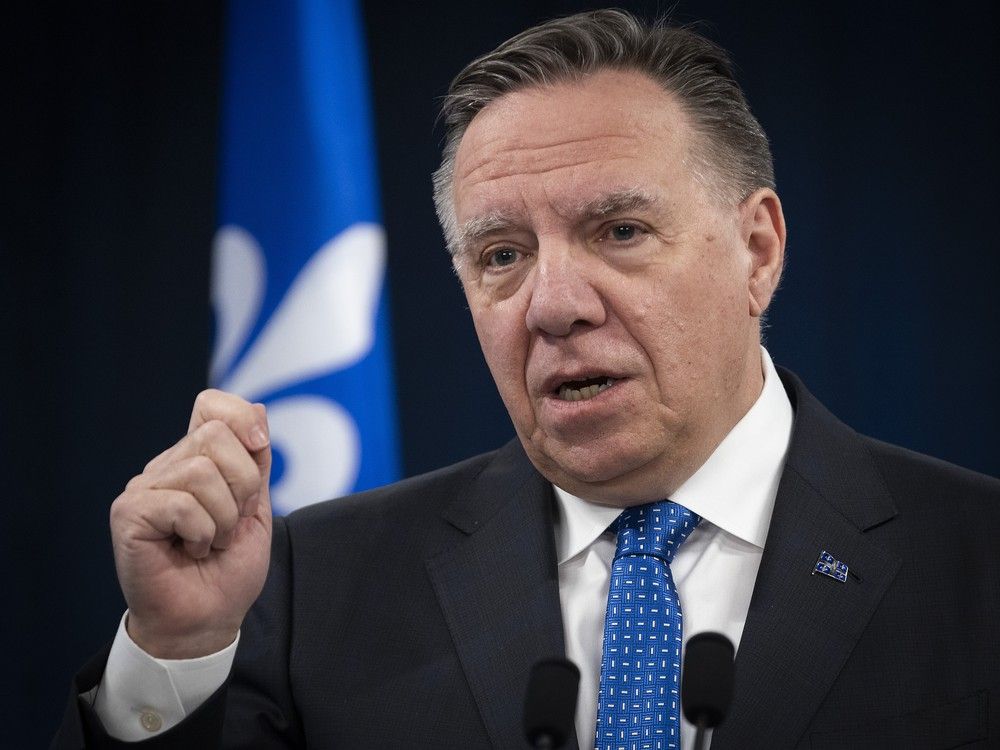 march 15, 2024 -- quebec premier françois legault gestures as he speaks to reporters
