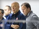 Montreal Canadiens General Manager Kent Hughes, left, and executive vice president of hockey operations Jeff Gorton watch their team's development camp at the CN Sports Complex in Brossard on Wednesday July 3, 2024.