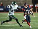 Montreal Alouettes quarterback Davis Alexander (10) breaks away from Saskatchewan Roughriders' Bryan Cox Jr. at Molson Stadium on Thursday, July 25, 2024. Montreal hasn't lost since that game.