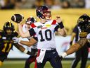 Alouettes fullback David Dallaire takes advantage of rare chance to shine 3 Montreal Alouettes quarterback Davis Alexander throws a pass under pressure during second-half CFL action against the Tiger-Cats in Hamilton, Ont., on Friday, August 2, 2024.