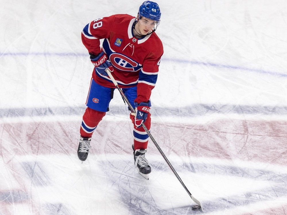 Canadiens defenceman Lane Hutson skates across the team's logo at centre ice during warmup before NHL game against the Detroit Red Wings at the Bell Centre on April 16, 2024.