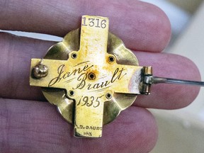 Treasures of the MUHC include a nurse's pin.