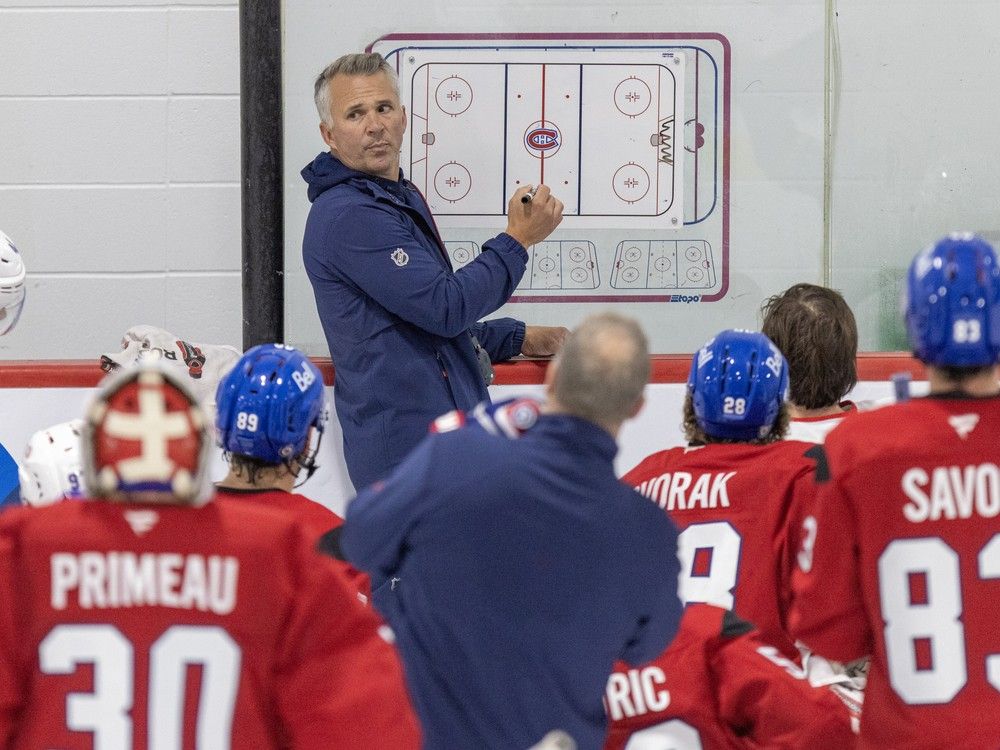 Head coach Martin St. Louis outlines a drill during first day of Canadiens training camp in Brossard last month. St. Louis has taken the reins of the team's struggling power play.