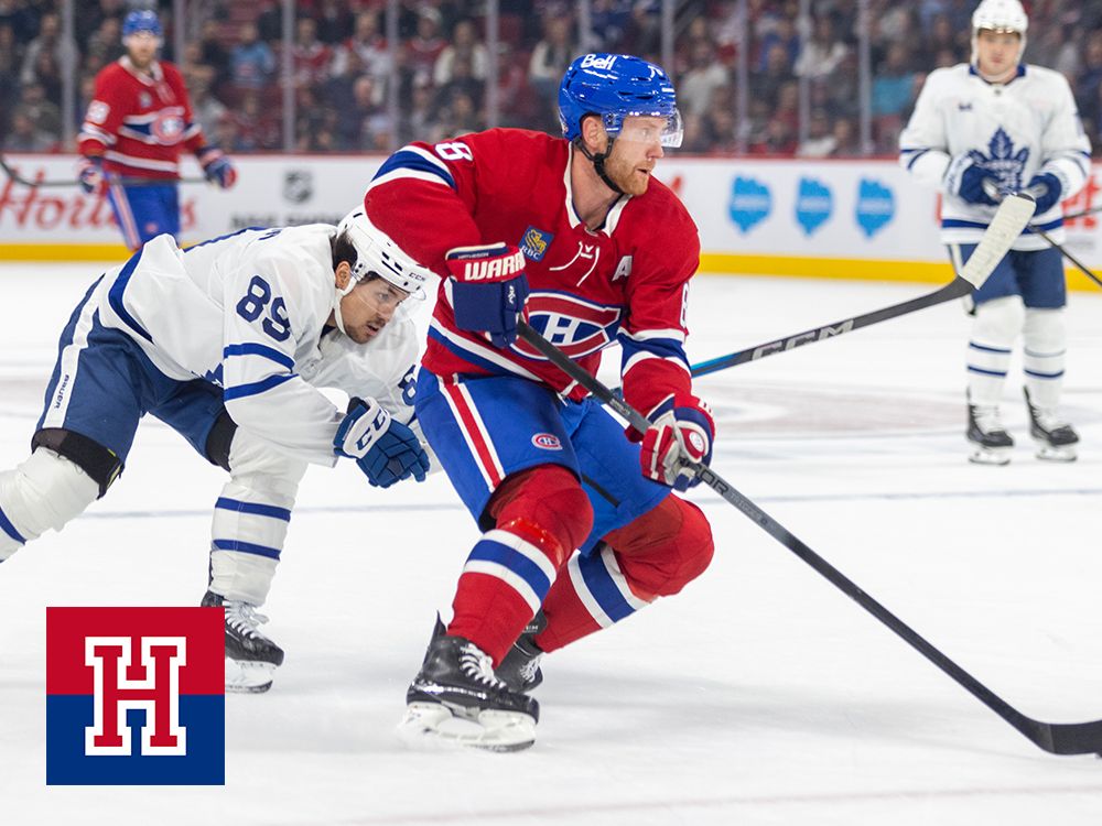 Montreal Canadien Mike Matheson skates with the puck past Nicholas Robertson of the Toronto Maple Leafs on Oct. 9, 2024.