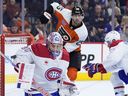 Montreal Canadiens' Cayden Primeau (30) blocks a shot against the Philadelphia Flyers Oct. 27, 2024, in Philadelphia.
