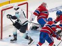 Seattle Kraken's Brandon Montour scores on Montreal Canadiens goaltender Cayden Primeau during second-period action in Montreal on Tuesday, Oct. 29, 2024.