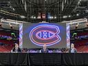 Canadiens' Jeff Gorton, executive vice-president hockey operations, left, Kent Hughes, new general manager, and owner Geoff Molson, right, at a press conference introducing Hughes to the media at the Bell Centre in Montreal on Jan. 19, 2022. Ownership of a team in any of the major leagues is now a virtual license to print money, Jack Todd writes.