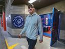 Alouettes quarterback Cody Fajardo leaves the Montreal dressing room as players gathered to clean out their lockers at the Olympic Stadium on Monday.
