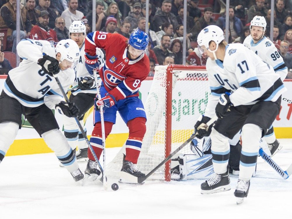 MONTREAL, QUE.: November  26, 2024 -- Montreal Canadiens Joahua Roy battles for the puck while surrounded by Utah Hockey Club's Ian Cole, left, Lawson Crouse, Nick Bjugstad and Mikhail Sergchev during first period of National Hockey League game in Montreal Tuesday November 26, 2024.