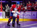 Canadiens get their first OT win of season, beating Blue Jackets 4-3 5 Canadiens' Josh Anderson was quick to drop his stick and help Easten, 6, get safely to the blue line during the Hockey Fights Cancer opening ceremony at the Bell Centre Saturday night.