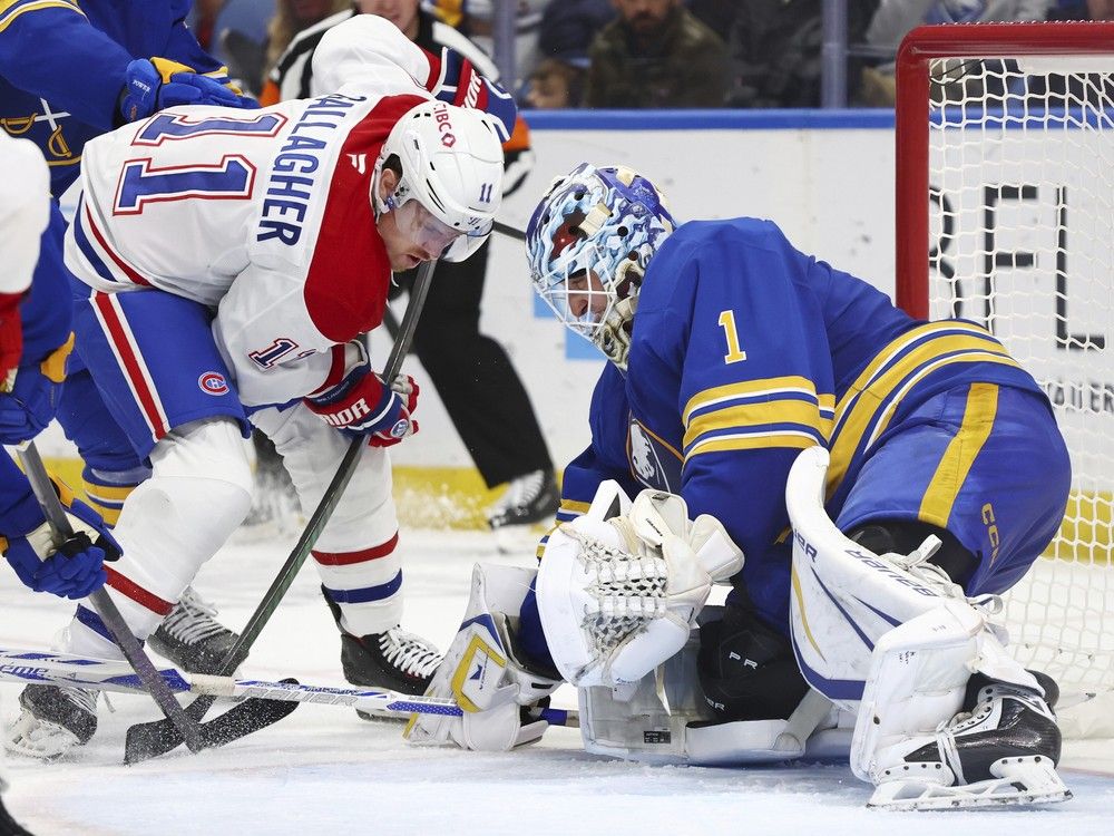 Montreal Canadiens right wing Brendan Gallagher (11) is stopped by Buffalo Sabres goaltender Ukko-Pekka Luukkonen (1) during the second period of an NHL hockey game Monday, Nov. 11, 2024, in Buffalo, N.Y.
