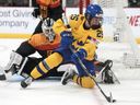 Jack Todd: Here's hoping the Victoire live up to their new moniker 3 Sweden forward Lina Ljungblom (25) battles for the puck against Germany goaltender Sandra Abstreiter (35) during third period IIHF Women's World Hockey Championship hockey action in Brampton, Ont., on Thursday, April 6, 2023.