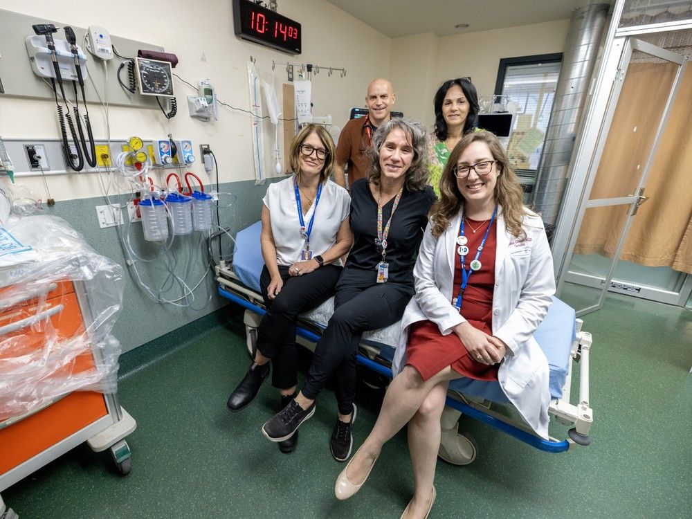  the nurses and doctors at st. mary’s hospital who volunteered to go to the herron residence in the pandemic’s early days: seated, from left: lea anne hogan, mary-lou foley and julia chabot; standing, rear: bruce campbell and rosetta antonacci.