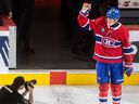 Stu's Slapshots: Canadiens' Kaiden Guhle was inspired by his parents 5 Patrik Laine waves to the crowd at Montreal's Bell Centre after being named first star of the Montreal Canadiens' game against the New York Islanders on Tuesday December 3, 2024. The Canadiens won 2-1 in overtime.