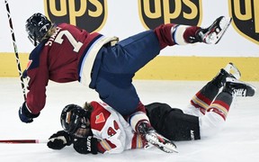 Montreal Victoire's Laura Stacey collides with Ottawa Charge's Anna Meixner.