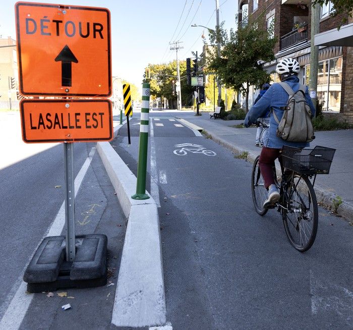  a cyclist heads east on de verdun st.’s bike path, which the city unveiled in 2024. this summer, the path was closed for water infrastructure work.