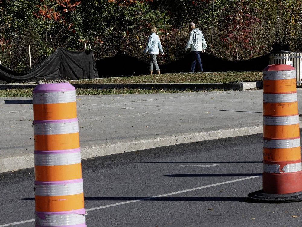  orange cones are part of the scenery at the new lookout at ruisseau-de montigny nature park as construction work continues on maurice-duplessis blvd.