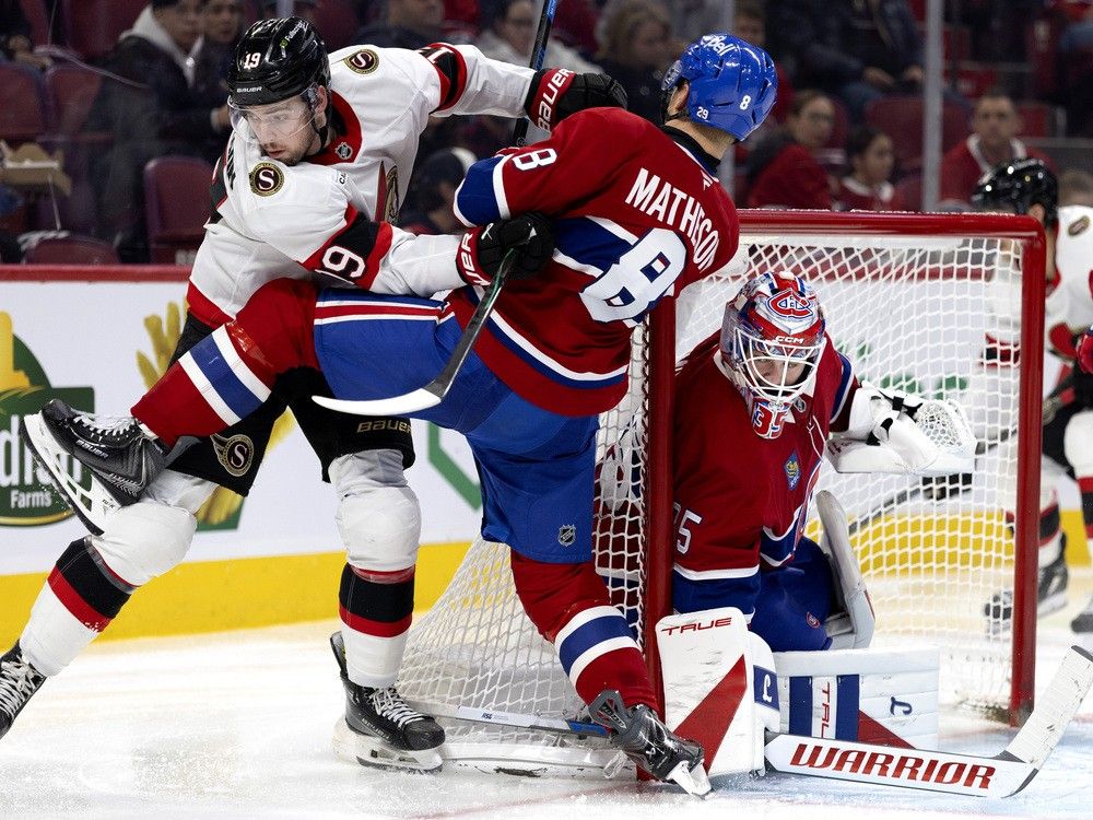 Canadiens defenceman Mike Matheson (8) ties up Ottawa Senators’ Drake Batherson (19) as Canadiens goaltender Sam Montembeault covers his net in Montreal on Saturday, Nov. 1, 2025. Canadiens defenceman Mike Matheson (8) ties up Ottawa Senators’ Drake Batherson (19) as Canadiens goaltender Sam Montembeault covers his net in Montreal on Saturday, Nov. 1, 2025.