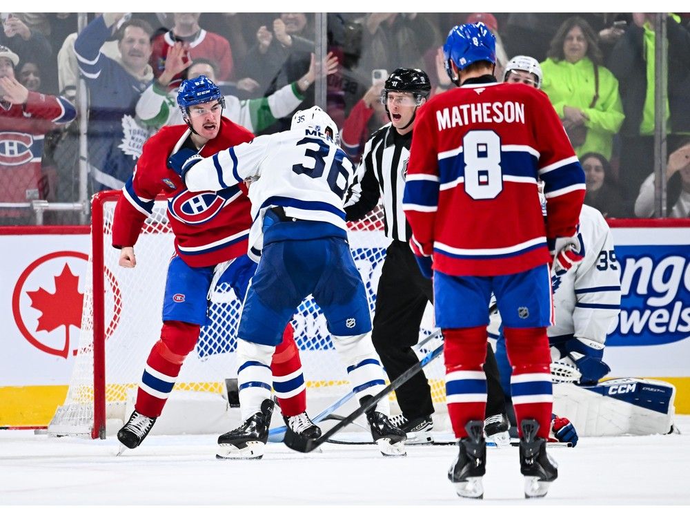  Canadiens winger Florian Xhekaj fights Maple Leafs’ Dakota Mermis during the third period in Montreal on Saturday.