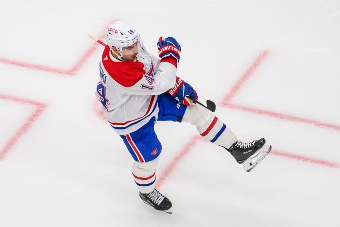  Montreal Canadiens centre Nick Suzuki celebrates scoring a goal during the third period of an NHL game against the Utah Mammoth, Wednesday, Nov. 26, 2025, in Salt Lake City.