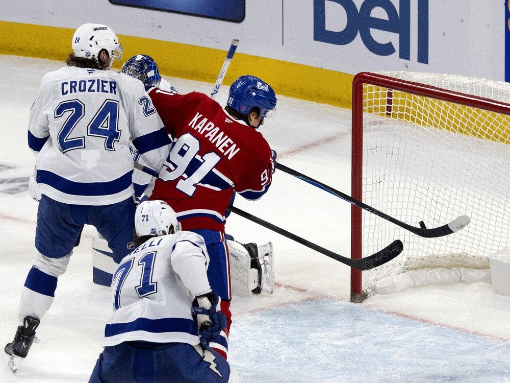 Canadiens centre Oliver Kapanen (91) taps the puck in the net to put the Canadiens on the scoreboard during the second period against the Tampa Bay Lightning in Montreal, on Tuesday, Dec, 9, 2025. Canadiens centre Oliver Kapanen (91) taps the puck in the net to put the Canadiens on the scoreboard during the second period against the Tampa Bay Lightning in Montreal, on Tuesday, Dec, 9, 2025.
