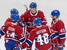 Canadiens forward Zachary Bolduc, centre, celebrates his second goal of game with teammates during the third period against the Chicago Blackhawks in Montreal on Thursday.