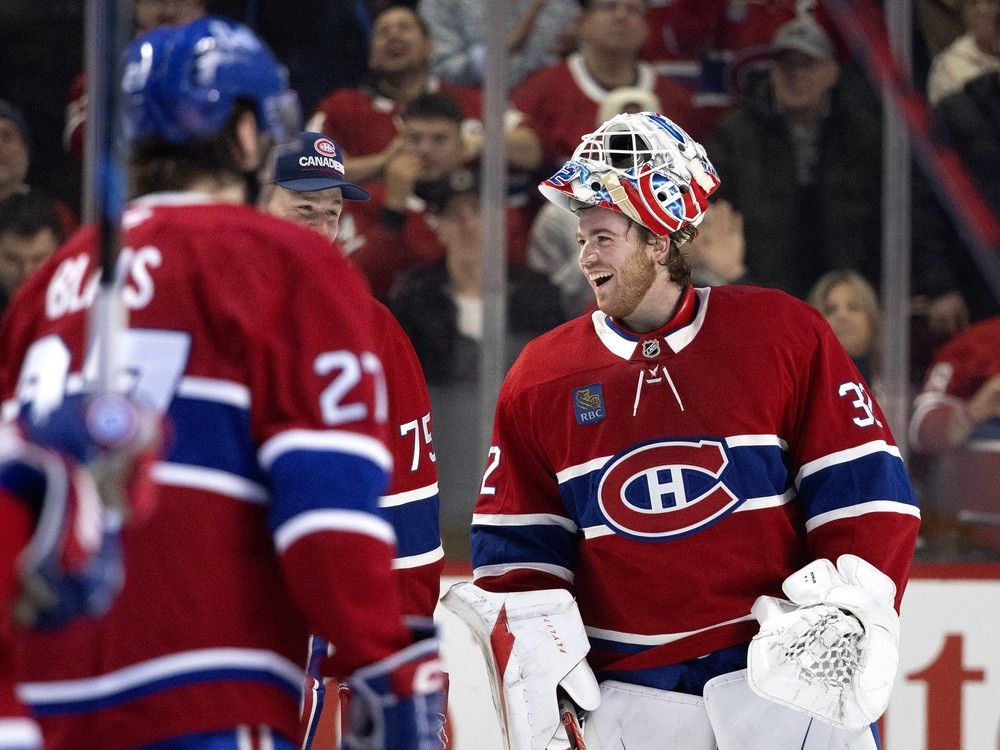 Canadiens goaltender Jacob Fowler (32) laughs with goaltender Jakub Dobes (75) after beating the Calgary Flames 4-1 in Montreal, on Wednesday, Jan. 7, 2026. Canadiens goaltender Jacob Fowler (32) laughs with goaltender Jakub Dobes (75) after beating the Calgary Flames 4-1 in Montreal, on Wednesday, Jan. 7, 2026.