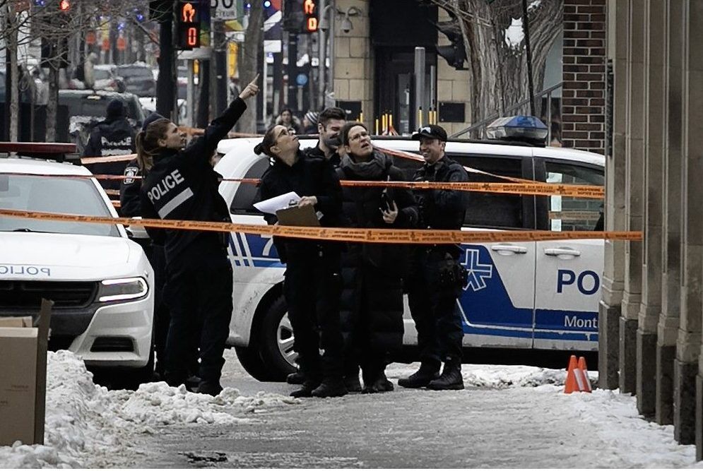 Montreal police officers at the scene following a police intervention which occurred earlier in the morning on the corner of St-Denis and Ste-Catherine on Thursday Jan. 8, 2026.