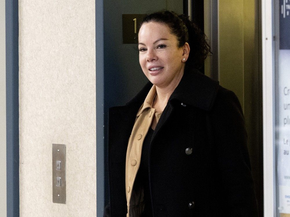  Gladys Rosana Lopez arrives at the Laval courthouse on Monday. She is charged with being an accomplice after the fact to murder.