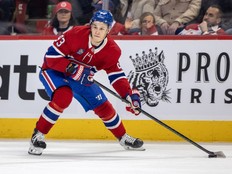 Canadiens winger Ivan Demidov looks to pass the puck during first period against the Vancouver Canucks in Montreal on Monday.