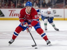 Canadiens' Alexandre Texier carries the puck through neutral zone.