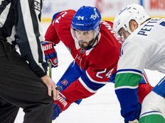 Canadiens' Phillip Danault off against Canucks' Elias Petterson during game last week.