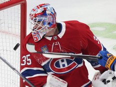 Canadiens goalie Samuel Montembeault looks back as the puck bounces out of the net on a goal by Buffalo Sabres' Zach Benson during second period in Montreal on Thursday.