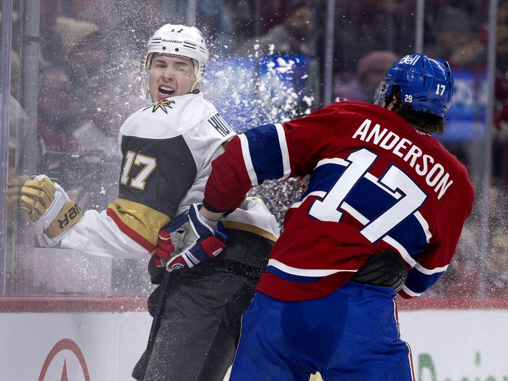  Vegas Golden Knights defenceman Ben Hutton (17) reacts to being checked by Canadiens right wing Josh Anderson (17) during third period NHL action in Montreal, on Tuesday, Jan. 27, 2026.