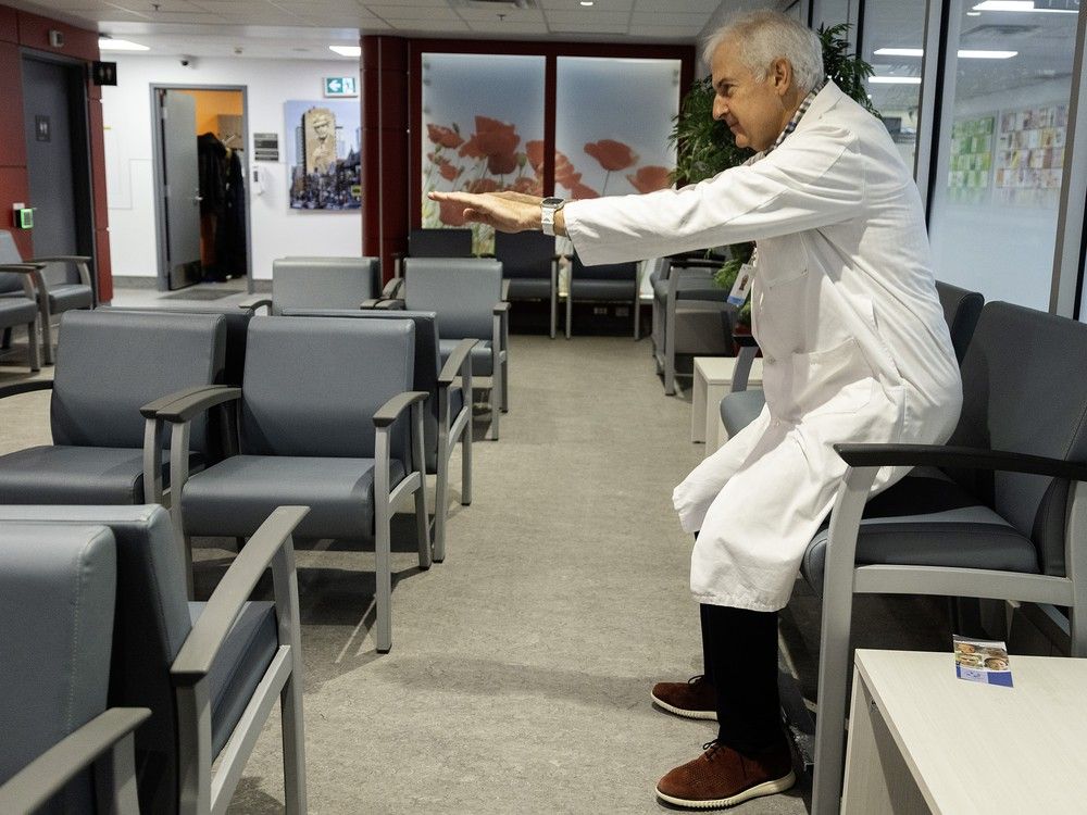 Dr. Ruby Friedman stands from a chair in the Susan & Aron Lieberman Family Wellness in Aging Geriatrics Centre at the Jewish General. Like some of the other seats in the waiting area, it is higher than standard — to make it easier for older people to stand back up from a seated position.