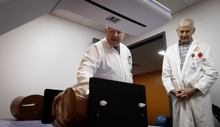 Dr. Gustave Duque, left, and Dr. Ruby Friedman in the DURAgym space at the Jewish General, where a dual-energy X-ray Absorptiometry imaging device measures the body’s composition of bone, muscle and fat and bone mineral density. (The items on the machine are used to calibrate it.)    