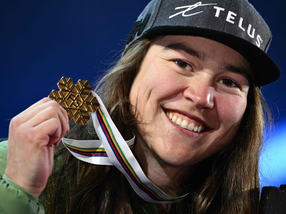  St-Ferréol-les-Neiges native Laurence St-Germain celebrates with her gold medal at the FIS Alpine Ski World Championship in Meribel, France, on Feb. 18, 2023.