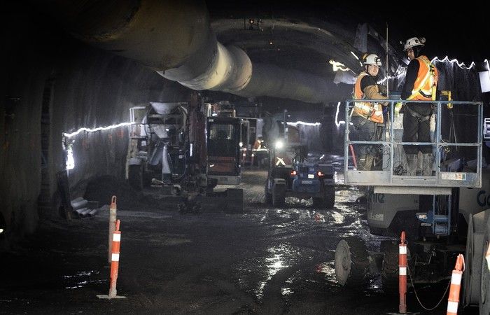  Workers are seen in the tunnel being excavated for the Blue Line métro extension on Monday, Feb. 23, 2026 at the Vertières metro station.
