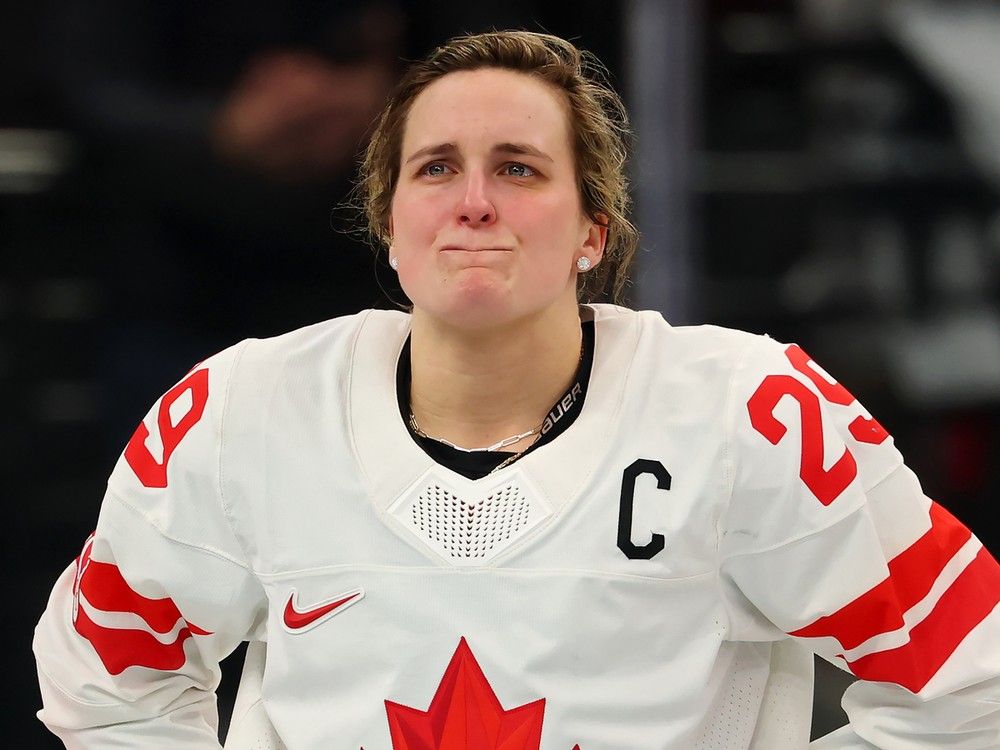  Team Canada’s Marie-Philip Poulin fights back tears after the team’s 2-1 overtime loss in the gold-medal game against the U.S. at the Santagiulia Ice Hockey Arena on Feb. 19, in Milan, Italy.
