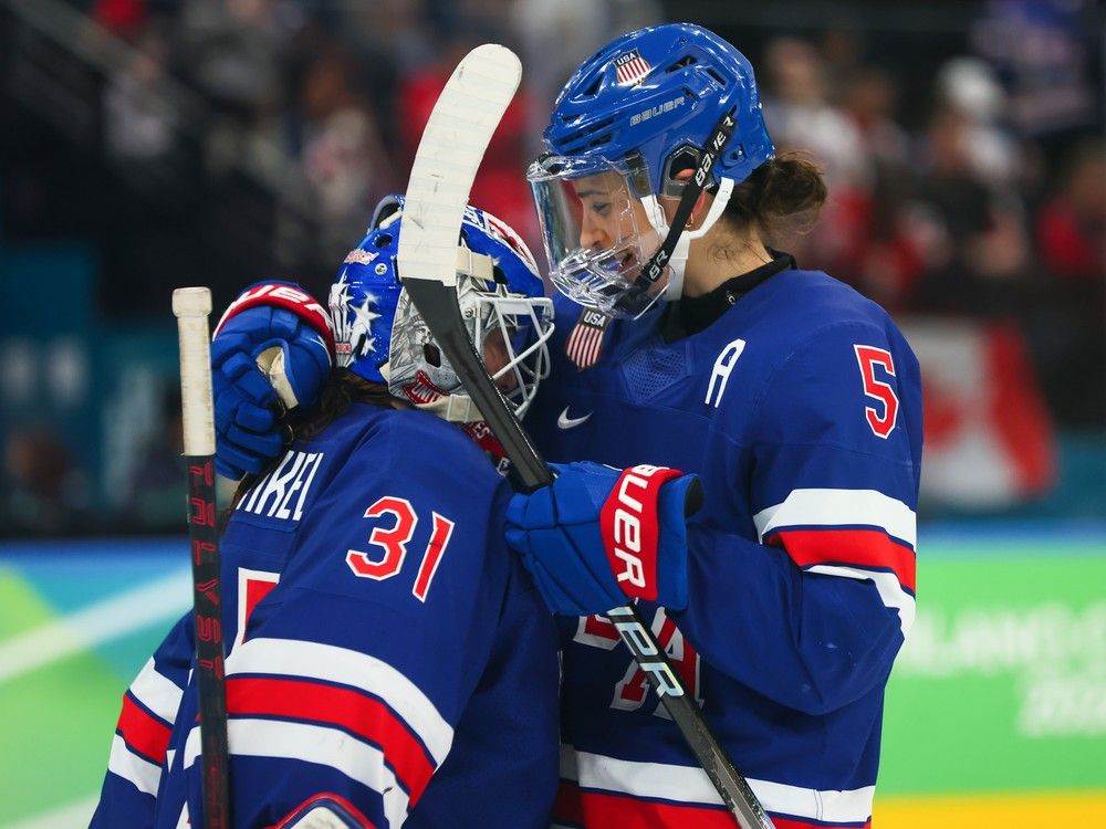 Aerin Frankel (31) and Megan Keller (5) of Team United States hug prior to overtime during the Women’s Gold Medal match between the United States and Canada on Day 13 of the Milano Cortina 2026 Winter Olympic games at Milano Santagiulia Ice Hockey Arena on Thursday, Feb. 19, 2026, in Milan, Italy. Aerin Frankel (31) and Megan Keller (5) of Team United States hug prior to overtime during the Women’s Gold Medal match between the United States and Canada on Day 13 of the Milano Cortina 2026 Winter Olympic games at Milano Santagiulia Ice Hockey Arena on Thursday, Feb. 19, 2026, in Milan, Italy.