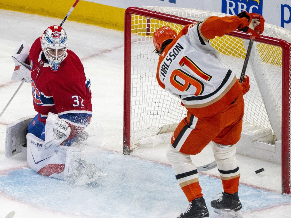 Ducks' Leo Carlsson scores into a wide-open net past Canadiens goaltender Jacob Fowler, the first of two goals he scored Sunday night at the Bell Centre.