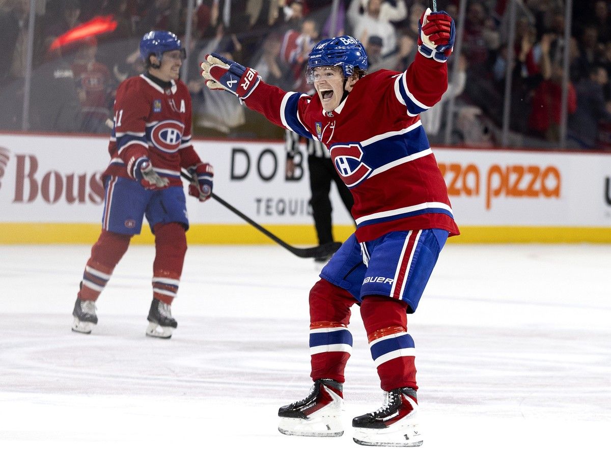 Canadiens right wing Cole Caufield (13) celebrates scoring the game winning goal against Nashville Predators goaltender Juuse Saros (74) during 1st OT period NHL action in Montreal, on Thursday, October 16, 2025.