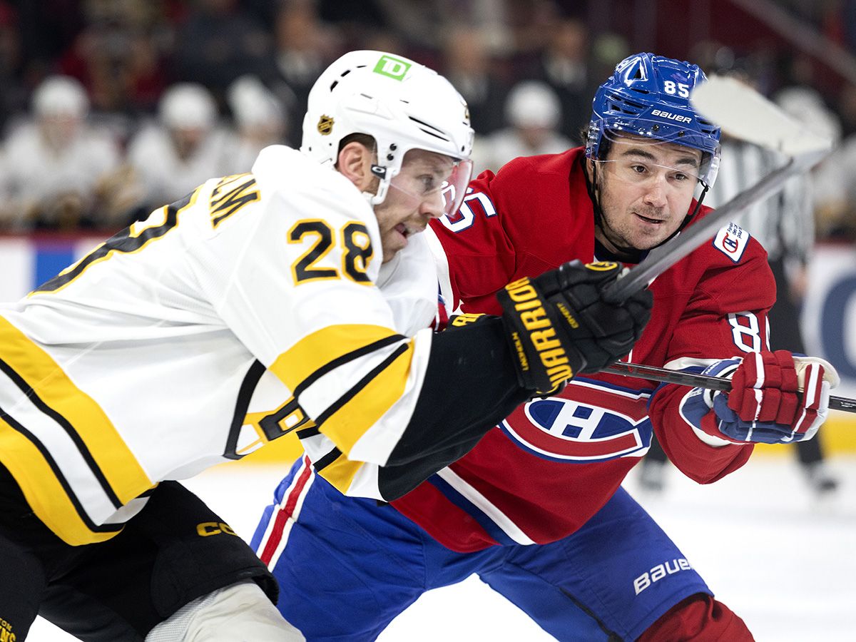 March 17, 2026 -- Montréal Canadiens left wing Alexandre Texier (85) and Boston Bruins center Elias Lindolm (28) during first period NHL action in Montreal on Tuesday, March 17, 2026.